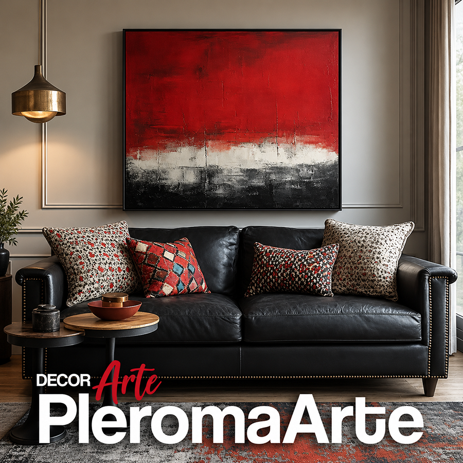 Cuadro al óleo abstracto rojo negro y blanco sobre sofá de cuero negro